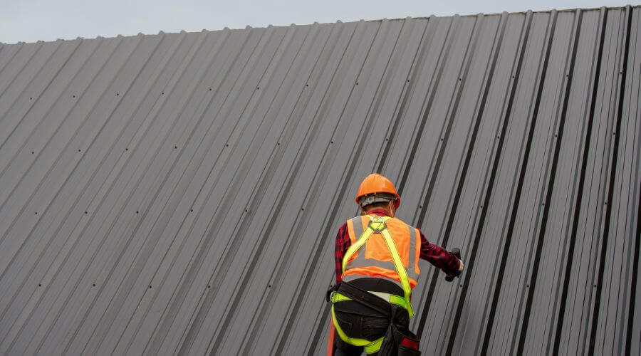 Professional metal roof installation services in Clio, IA